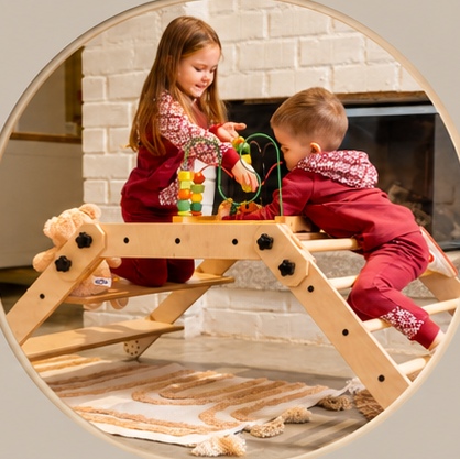 Two children exploring and playing on a Luula climbing set